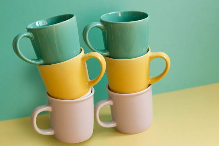 Two sets of mugs