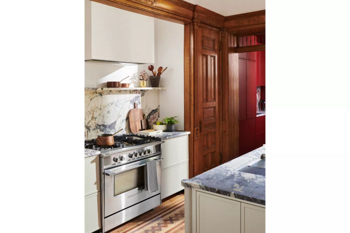 A kitchen that seamlessly blends modern design with the storied charm of the space