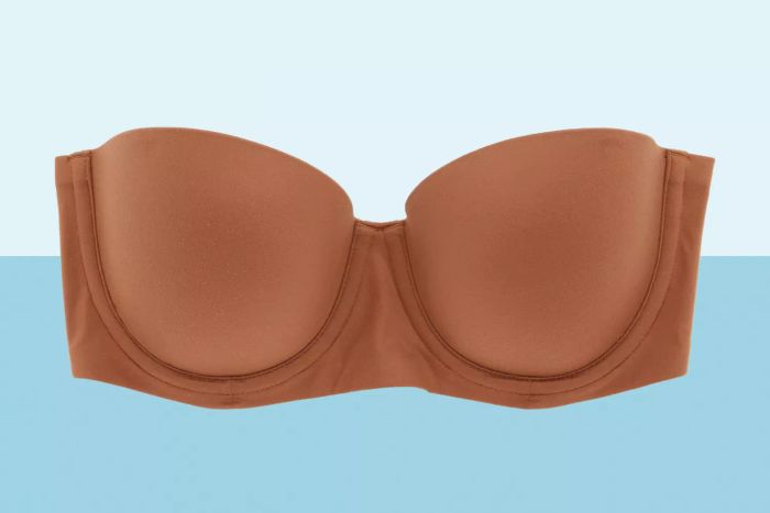 One of the finest strapless bras against a blue backdrop.