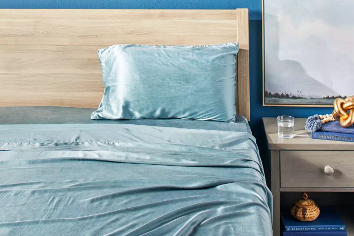 Bed arranged with the Colorado Home Co. Mulberry Silk Bed Sheets Set