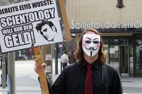An Anonymous member protesting outside a Church of Scientology building in Hamburg, Germany, in April 2012.