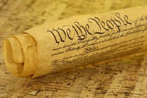 The Declaration of Independence written on a parchment.