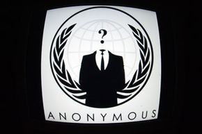 The Anonymous symbol features a man in a suit with a question mark where his head should be.