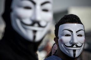 Protesters in Bahrain donning Guy Fawkes masks, a symbol of the Anonymous movement.
