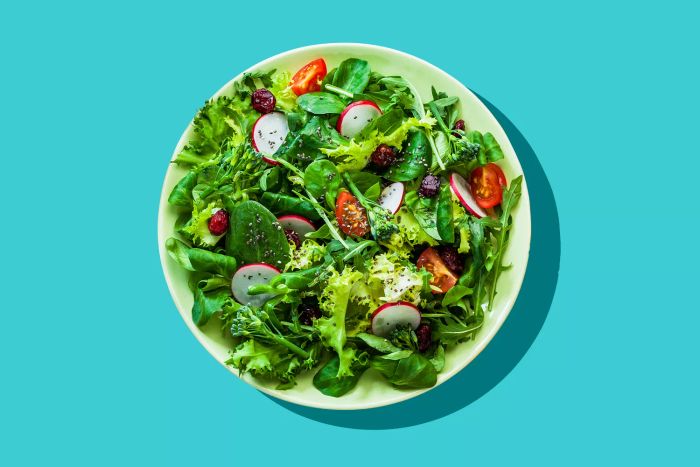 Healthy lifestyle essentials: A top-down view of a fresh, organic salad platter