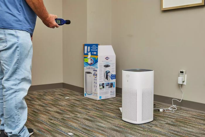 The Clorox Large Room True HEPA Air Purifier placed on a carpeted floor