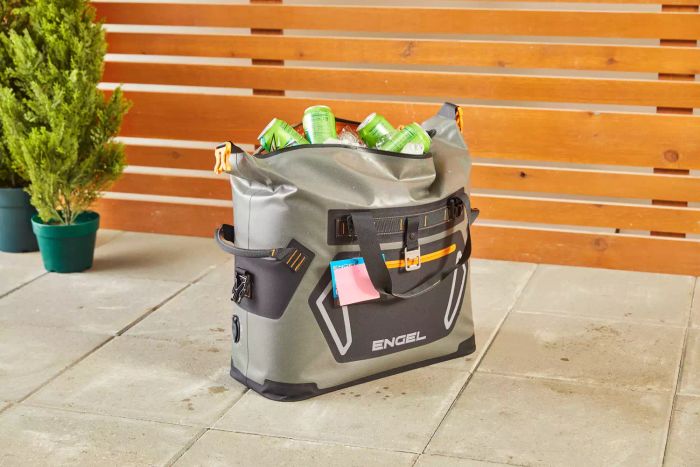 Engel HD30 Heavy-Duty Soft-Sided Cooler Bag resting on a patio, with a wooden fence in the background