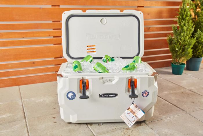 Lifetime 65-Quart High-Performance Cooler filled with ice and beverages, placed on a patio