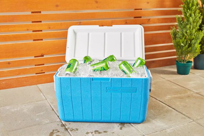 Coleman 48 Quart Cooler displayed on the tile floor