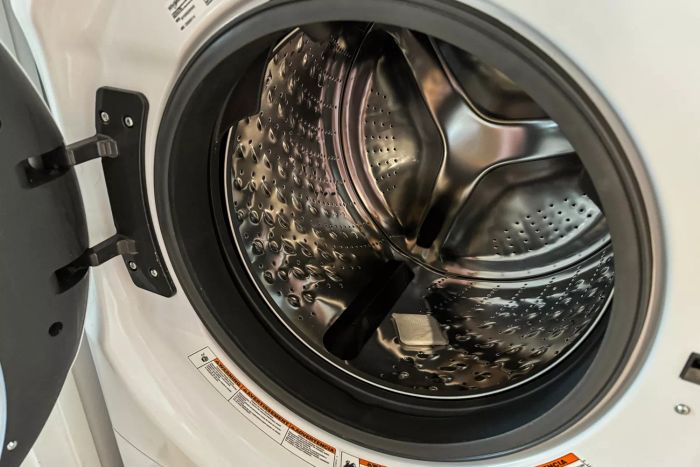 The Tide Evo Concentrated Detergent in a washing machine.
