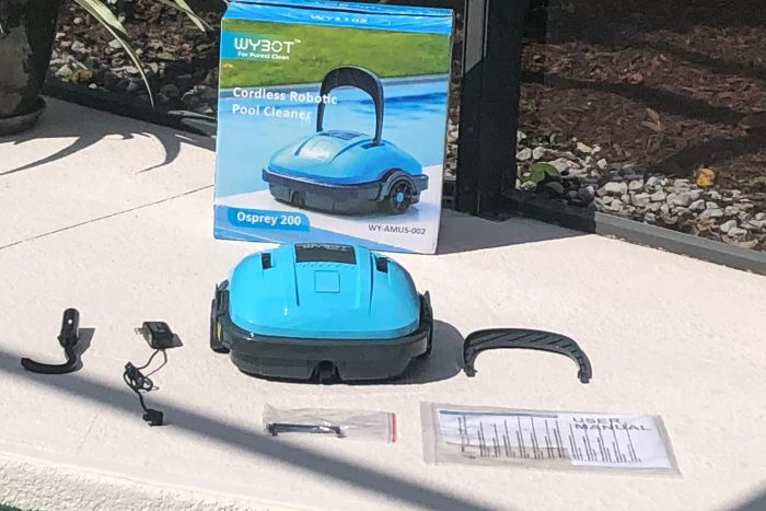 The WYBOT Cordless Robotic Pool Cleaner before it has been assembled