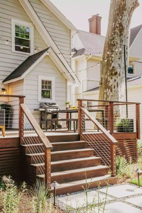 raised deck with stairs and railings