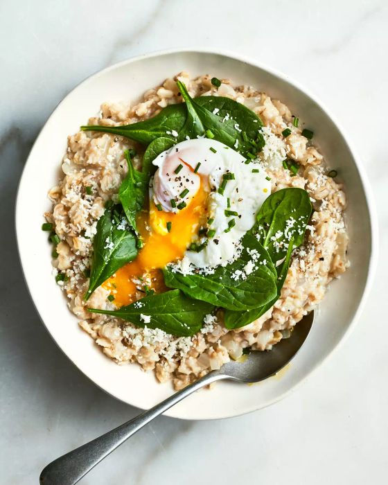 A savory bowl of oatmeal with egg and spinach is the breakfast you never knew you were missing. Check out the recipe for Savory Oatmeal With Spinach and Poached Eggs.