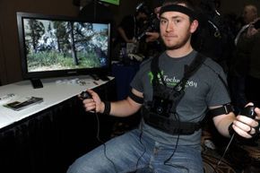A man is wearing a smart vest designed for gaming.
