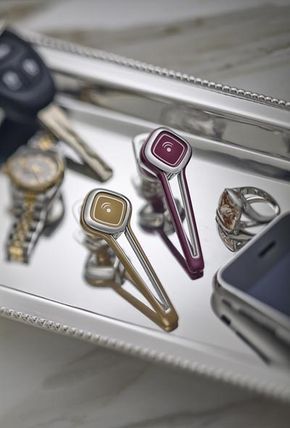 A display showcasing designer Bluetooth headsets.