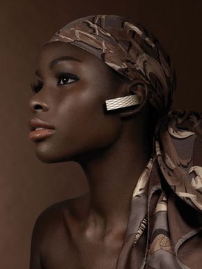 A woman using a Bluetooth headset.