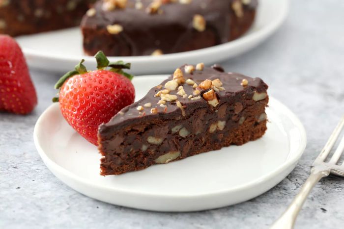 Instant Pot brownies cut into slices on a plate.
