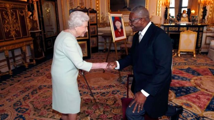 In 2014, Queen Elizabeth II awarded Sir Rodney Williams a knighthood, marking the occasion with a handshake.