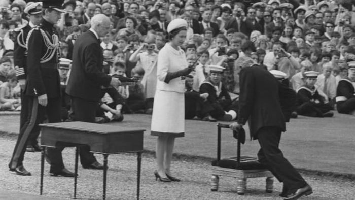 In 1967, Sir Francis Chichester received his knighthood from Queen Elizabeth II.