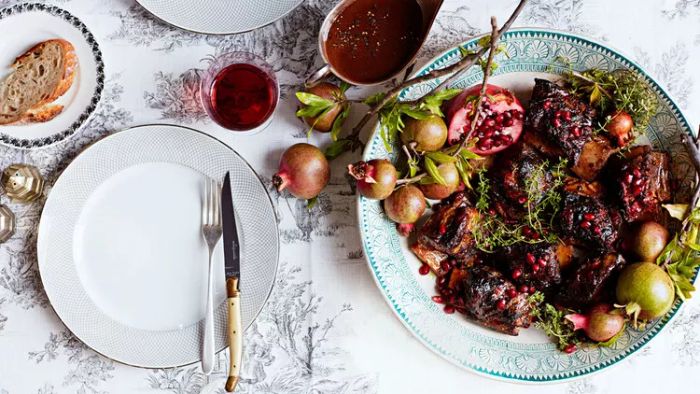 Miso-tomato braised short ribs served with pomegranate