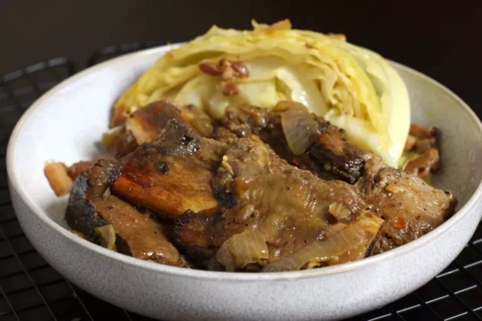 Oven Braised Beef Short Ribs served with Cabbage.