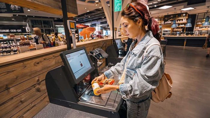 A woman comes across a UPC code at the grocery store.
