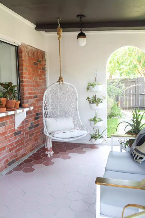 porch swing above an outdoor patio