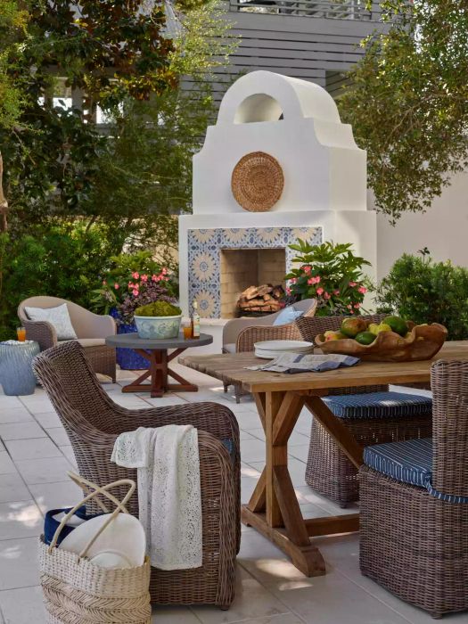 backyard patio featuring a fireplace