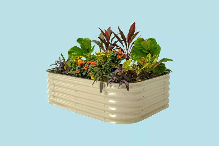 The Vego Garden 6-in-1 Raised Garden Bed Kit set against a serene blue backdrop