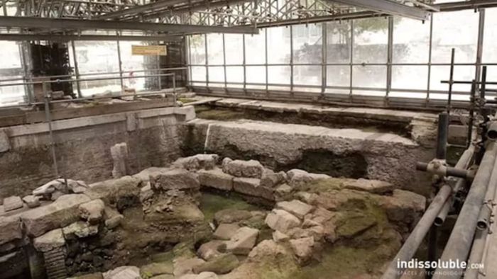 The same site, with the roof removed, revealing the ancient monument beneath the Augustan pavements.
