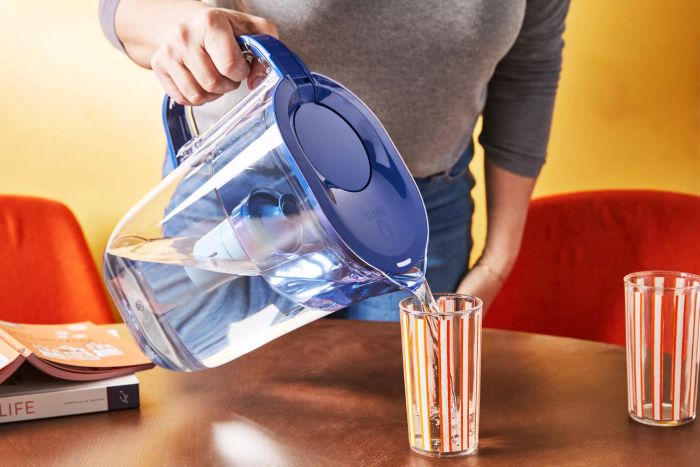 The Brita Water Pitcher dispensing water into a glass