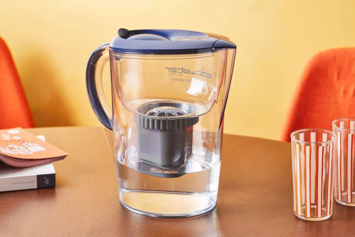 The Epic Water Filter Pitcher resting on a table