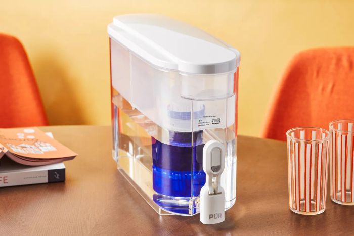 The Pur Plus 30-Cup Dispenser placed on a table