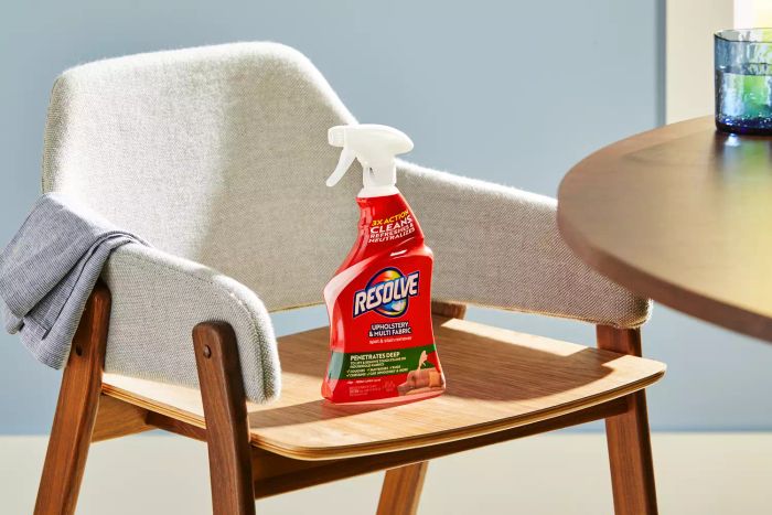 Resolve Multi-Fabric Cleaner & Upholstery Stain Remover displayed on a dining room chair.