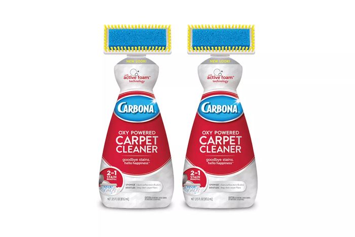Two bottles of Carbona Oxy Powered 2-in-1 Carpet Cleaner.