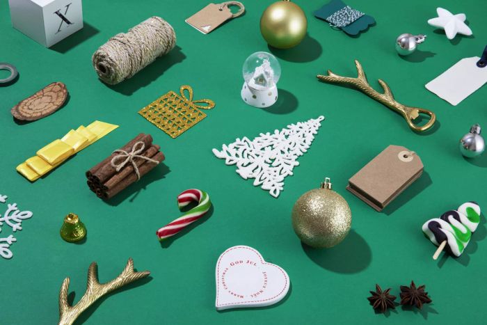 Things to declutter in February, including ornaments and gift wraps on a teal background
