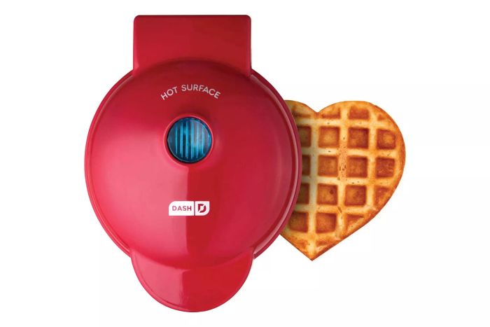 The DASH Mini Waffle Maker is perfect for single servings, making it ideal for individuals who enjoy a quick, fun breakfast.