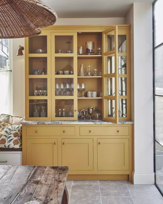 kitchen featuring a yellow hutch