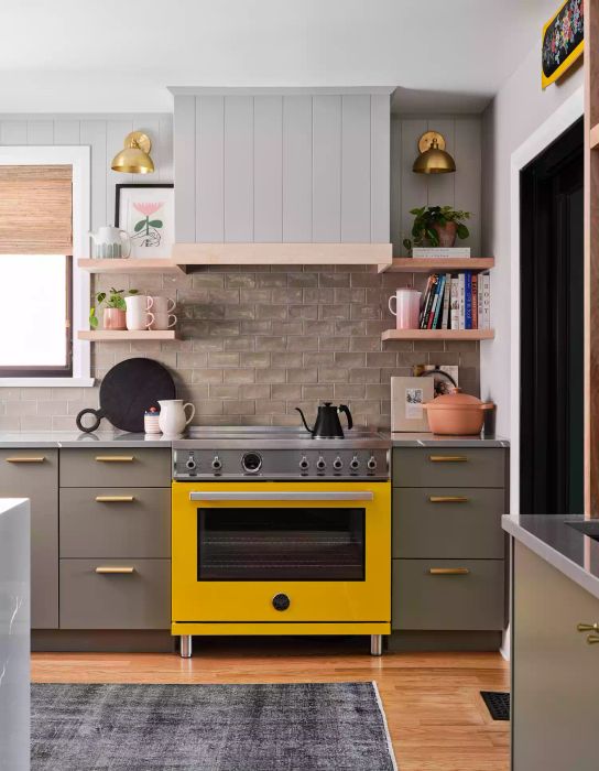 Gray kitchen featuring a yellow stove