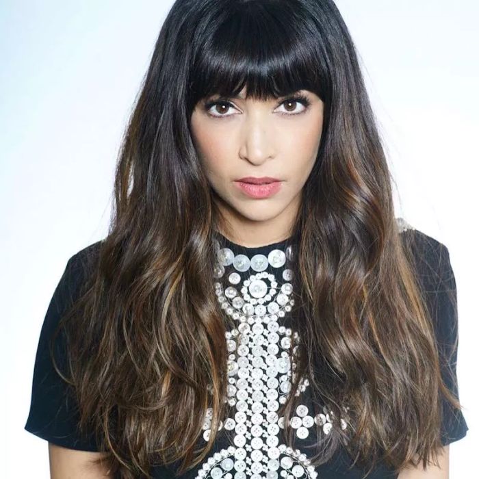 Hannah Simone styles her long ombre hair with thick, blunt bangs