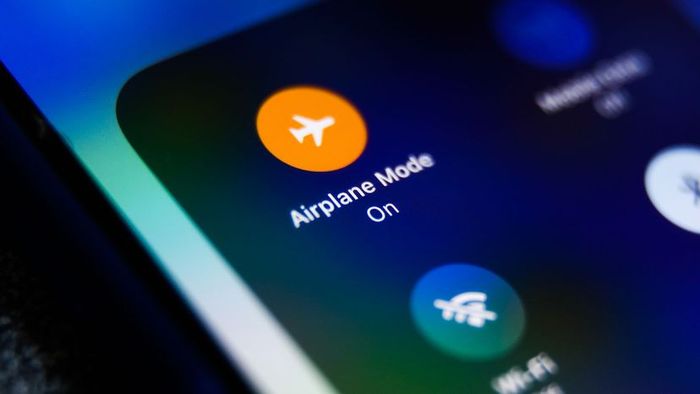 A phone screen displaying the Airplane Mode icon.