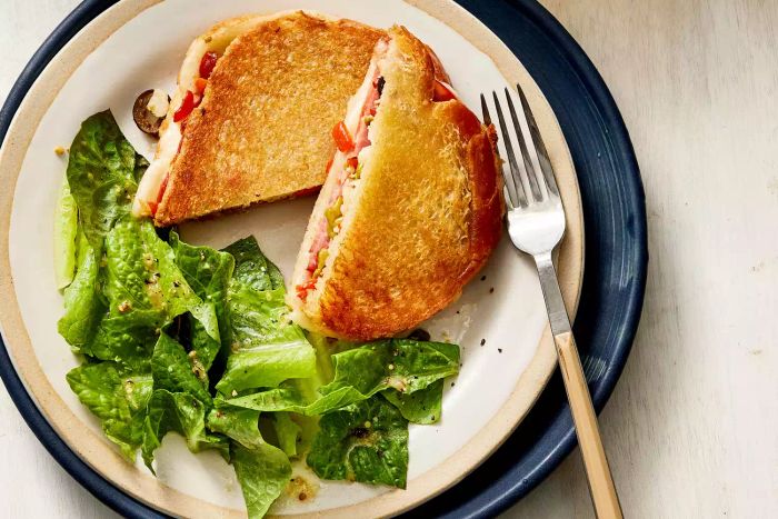 Muffaletta-Grilled Cheese Sandwiches with Romaine Salad
