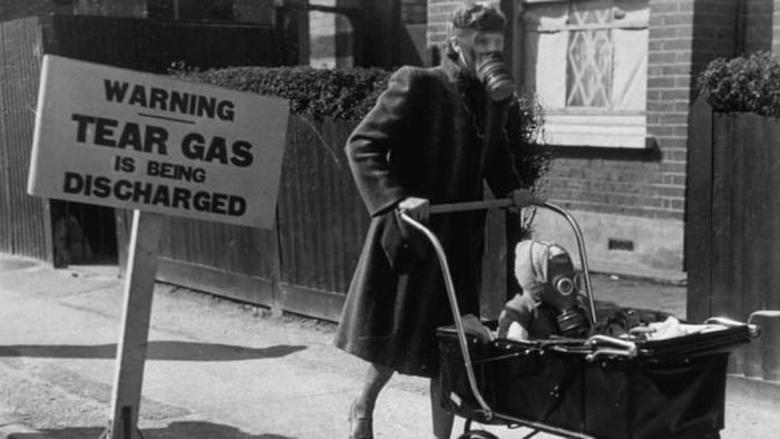 In 1941, Londoners participated in a civilian gas drill, utilizing tear gas during a safety exercise.