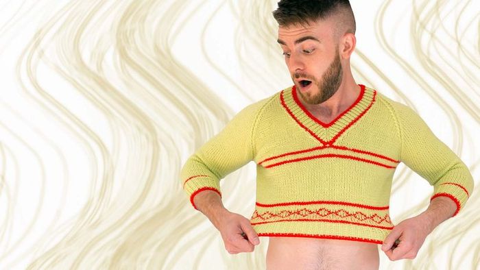 A person wearing a yellow and red shirt that has been shrunk.