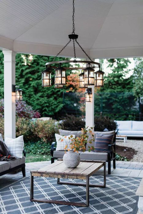 Outdoor patio with chandelier lighting