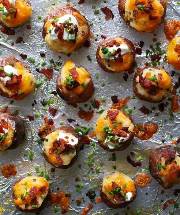 These bite-sized potatoes are utterly irresistible, with a cheesy, creamy filling encased in thin, crispy potato skin. Discover the recipe for Mini Twice-Baked Loaded Potatoes.