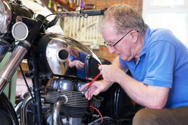 8-working-on-cycle-in-garage-149126633