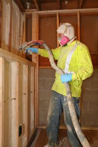Applying insulation to a home renovation or addition project.