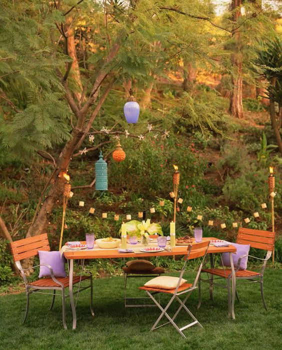Outdoor table and chairs with hanging lights