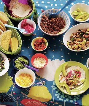 Taco bar with toppings and sides